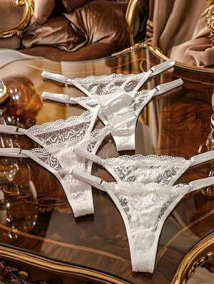 Ivory csipkés tanga állítható pánttal