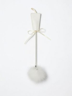 Testsimogatóval kiegészített paskoló 